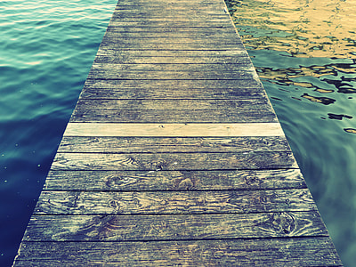 close up photography of grey wooden dock thumbnail