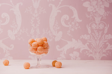 brown pastry balls on clear drinking glass thumbnail