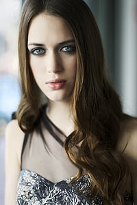 woman wearing black and white sleeveless top thumbnail
