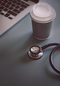 stethoscope beside cup thumbnail