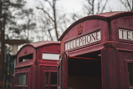 selective focus photography of brown telephone booth thumbnail
