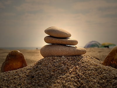 brown 3-layer balance stone on sand thumbnail