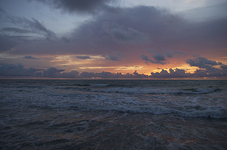 landscape photo of body of water during sunset thumbnail