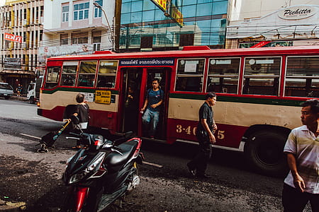 man walking from bus thumbnail