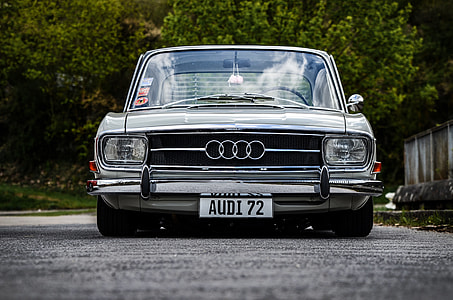 gray Audi vehicle on road at daytime thumbnail