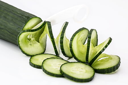sliced cucumber on white surface thumbnail