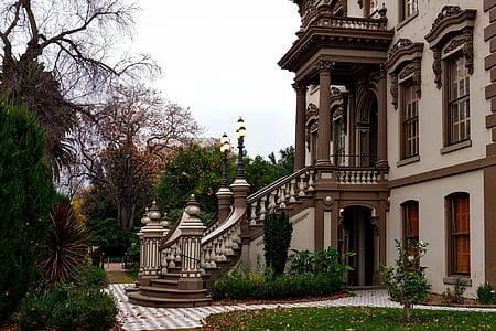 photo of white painted house near trees thumbnail