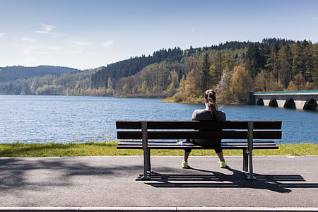woman sitting on bench thumbnail