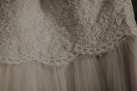 closeup photo of white lace dress thumbnail