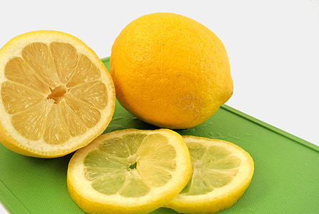 sliced lemon on chopping board thumbnail