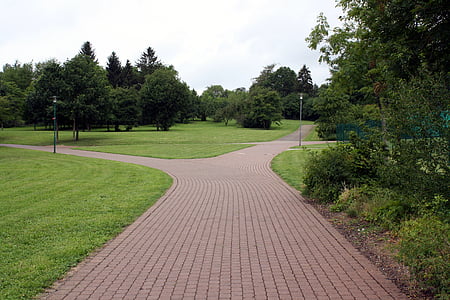 gray concrete pathway at daytime thumbnail