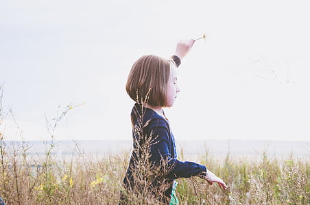girl on grass field thumbnail