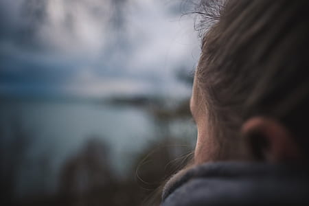 selective focus photography of woman thumbnail