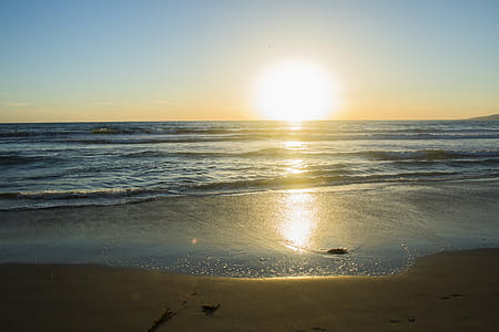 Beach Sun Reflections Photo thumbnail