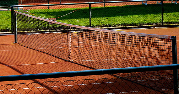 tennis court during daytime thumbnail