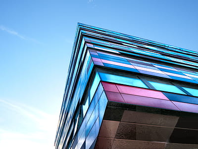 blue and pink building under blue sky thumbnail