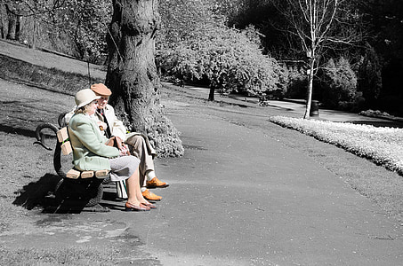 selective color photo of couple on bech thumbnail