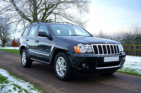 parked black Jeep SUV thumbnail