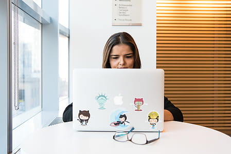 Woman Using Macbook thumbnail