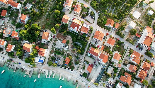 top-view photography of building near beach thumbnail
