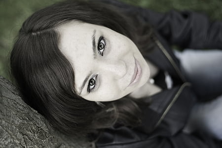 selective focus photo of woman with black wavy hair thumbnail