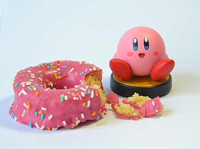 Kirby figurine and pink doughnut thumbnail