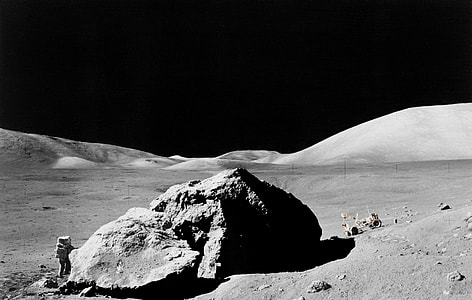 grayscale photo of man on the moon thumbnail