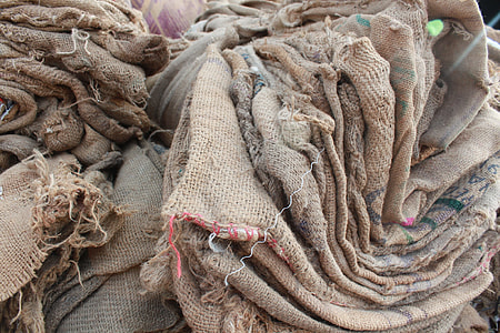 bundle of brown mesh rugs thumbnail