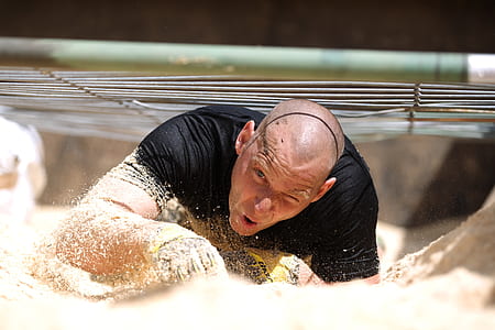 man crawling on sand thumbnail