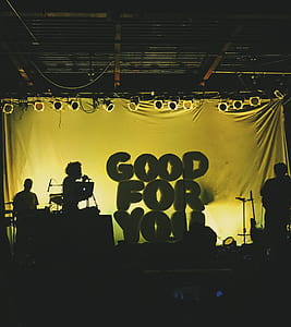 Good For You balloons on stage between performing band thumbnail