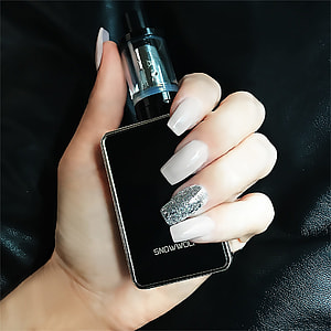 person holding black variable box mod thumbnail