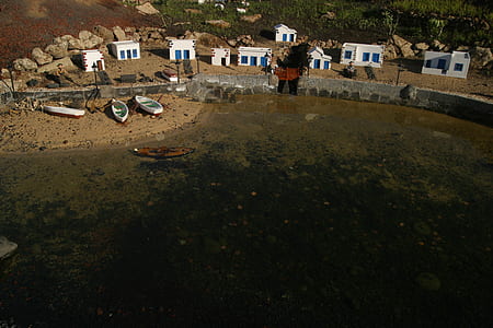 Aerial Photo of Boats Beside Body of Water thumbnail