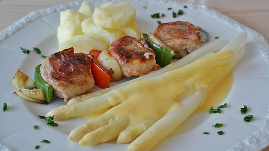 three meat slices and kebab on white ceramic plate thumbnail