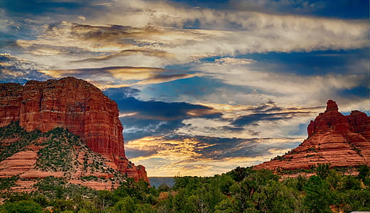 maroon mountain under the cumulus clouds thumbnail