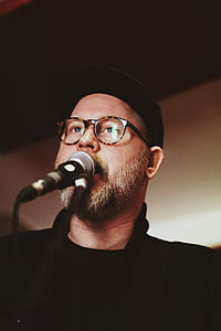 man singing on microphone thumbnail
