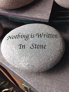 gray stone with Nothing is Written in Stone text thumbnail
