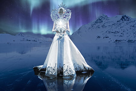 woman wearing white dress near mountain thumbnail