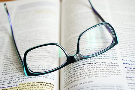 black framed eyeglasses on book page thumbnail