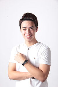 close up photo of a boy wearing white T-shirt thumbnail