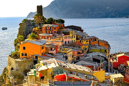 assorted-color houses on island thumbnail