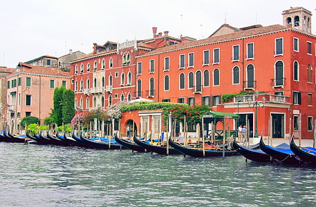 blue canoes on body of water during daytime thumbnail