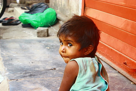 toddler wearing teal sleeveless shirt thumbnail