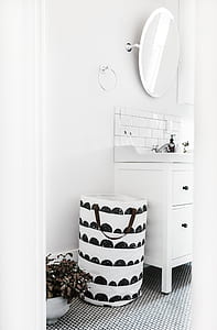 white and black bag near mirror thumbnail