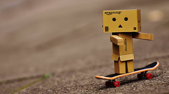 selective focus of wooden block man figure on fingerboard thumbnail