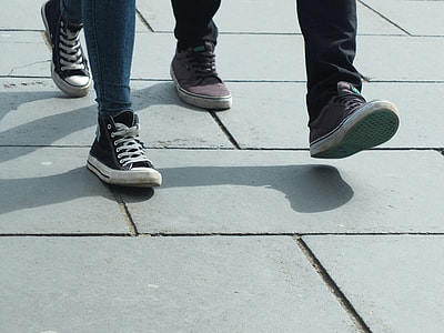 two pairs black-and-brown low-top sneakers thumbnail