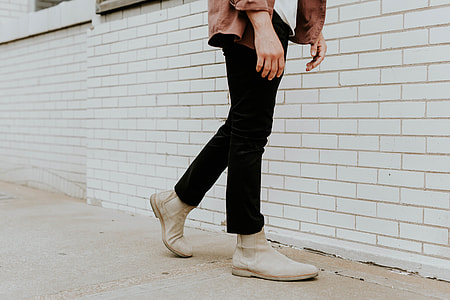 person with black pants and white shoes thumbnail