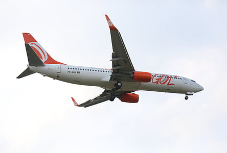 aerial photography of red and white airplane thumbnail