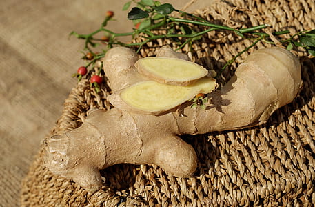 closeup photo of ginger on brown woven surface thumbnail