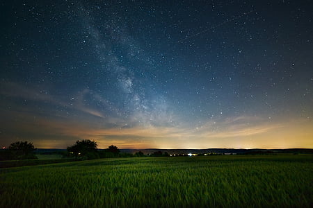 photo of green field and mountains thumbnail