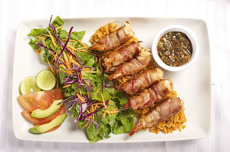 meat and shrimp with fresh vegetable and dip on white tray thumbnail